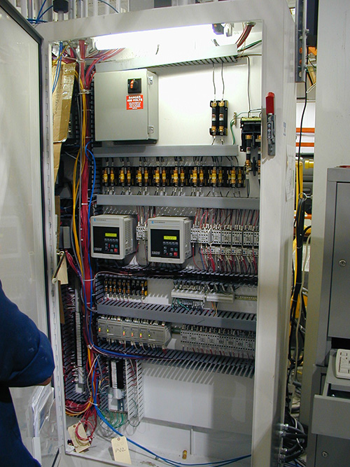 Panel with VFD's being debugged on site